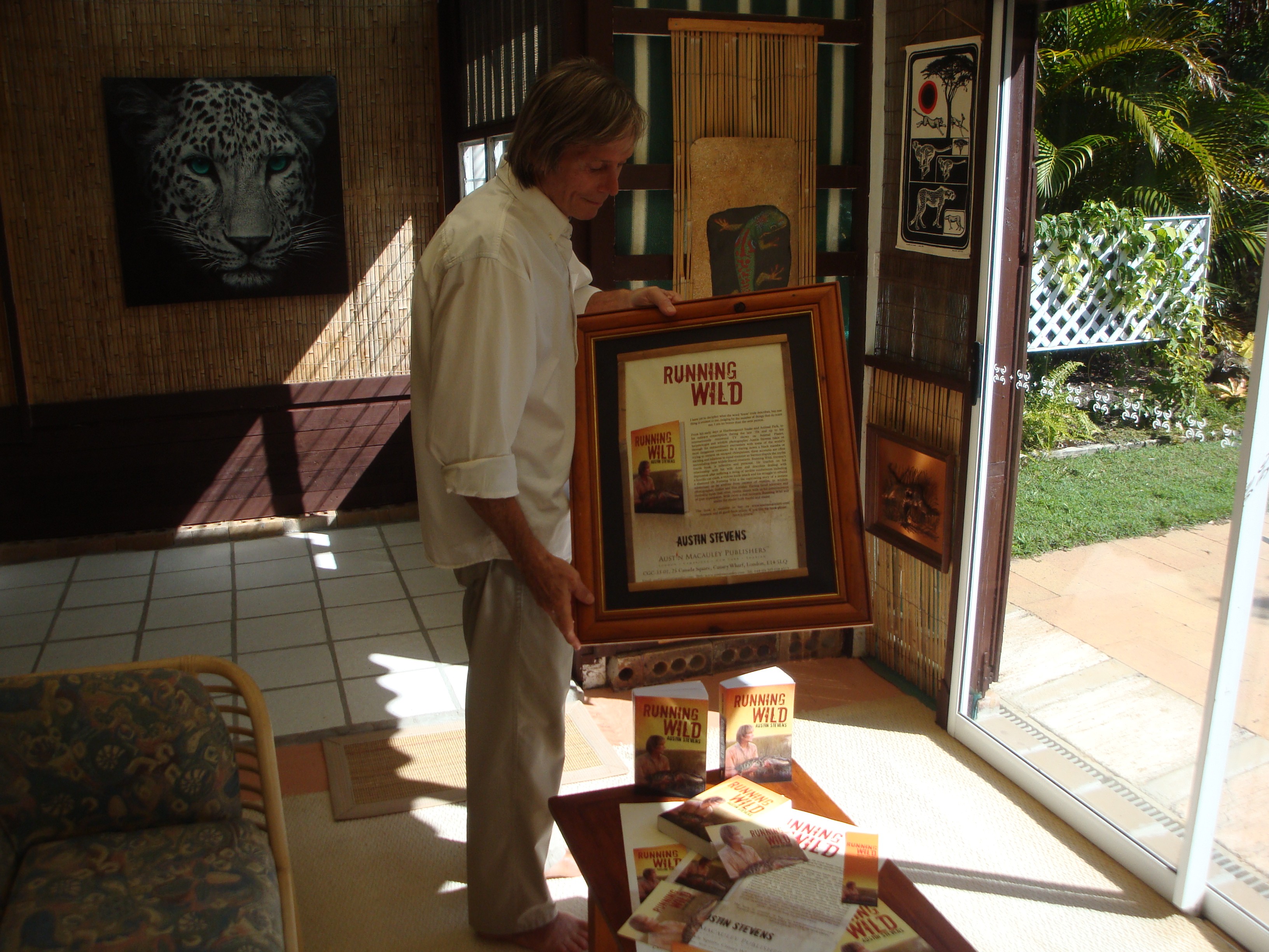 Austin Steven shows framed poster of ‘Running Wild’